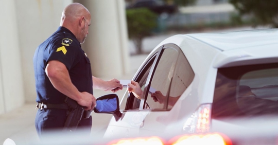 police officer getting the driver's license