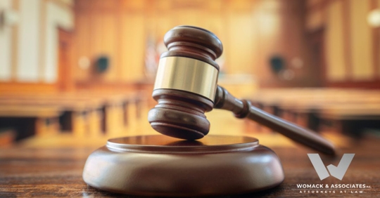 Judges gavel in court room legal trial and law background